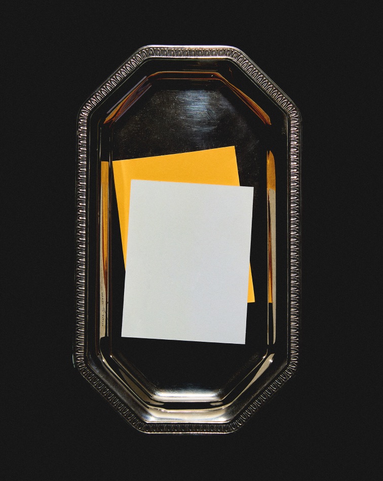 A letter presented on a silver tray